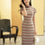 A beige base color with zigzag stripes in red, blue and brown|Modern one-Pieces Qipao Dress（倾黛）