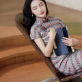 A beige base color with zigzag stripes in red, blue and brown|Modern one-Pieces Qipao Dress（倾黛）