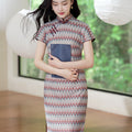 A beige base color with zigzag stripes in red, blue and brown|Modern one-Pieces Qipao Dress（倾黛）